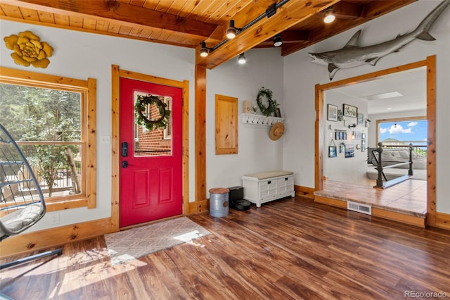 1380 Oak Valley Rd, Sedalia, CO 80135 - foyer with wood finished floors and a wood ceiling with exposed beams