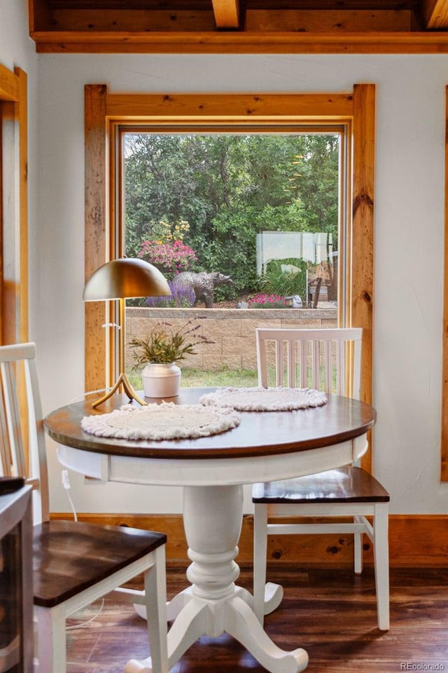 1380 Oak Valley Rd, Sedalia, CO 80135 - dining room featuring wood finished floors and baseboards