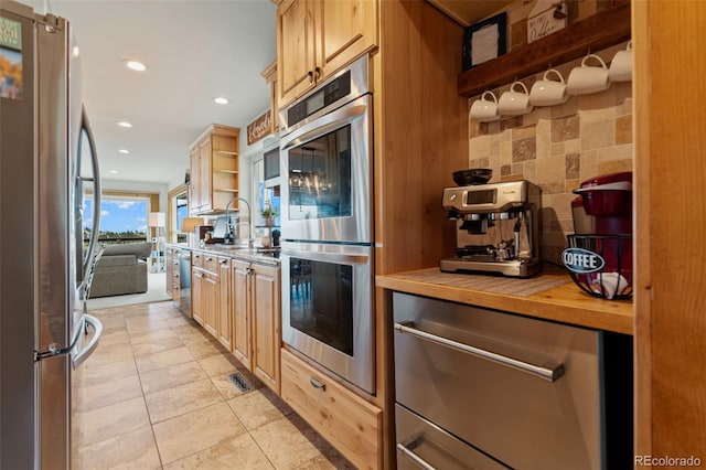 1380 Oak Valley Rd, Sedalia, CO 80135 - kitchen with stainless steel appliances, open shelves, tasteful backsplash, light countertops, and recessed lighting