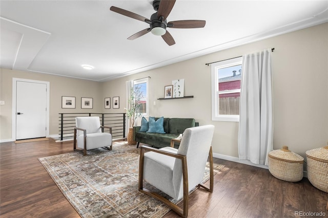 9220 Yucca Way, Thornton, CO 80229 - living room featuring wood finished floors, baseboards, and ceiling fan