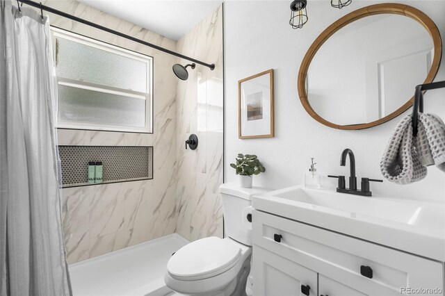 9220 Yucca Way, Thornton, CO 80229 - full bathroom featuring a shower with curtain, toilet, and vanity