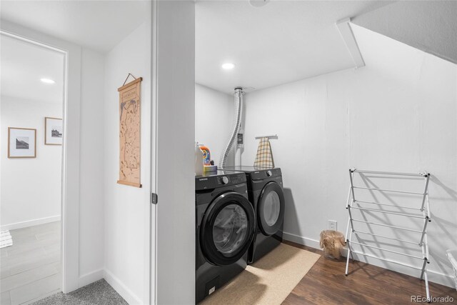 9220 Yucca Way, Thornton, CO 80229 - laundry area featuring washer and clothes dryer, baseboards, recessed lighting, and dark wood-style flooring