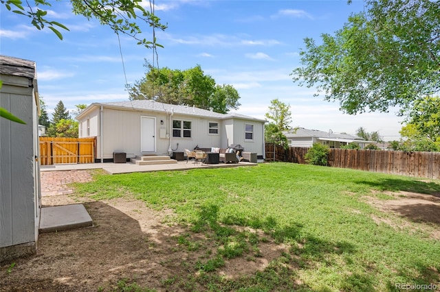 9220 Yucca Way, Thornton, CO 80229 - back of house with entry steps, a patio, and an outdoor hangout area