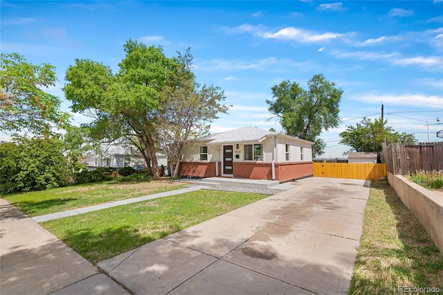 9220 Yucca Way, Thornton, CO 80229 - bungalow-style home with brick siding and concrete driveway