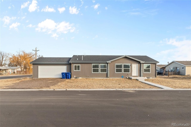 single story home with a garage