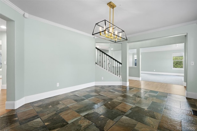 7837 Aravon Ct, Lone Tree, CO 80124 - empty room featuring stone tile flooring, crown molding, stairs, baseboards, and a chandelier