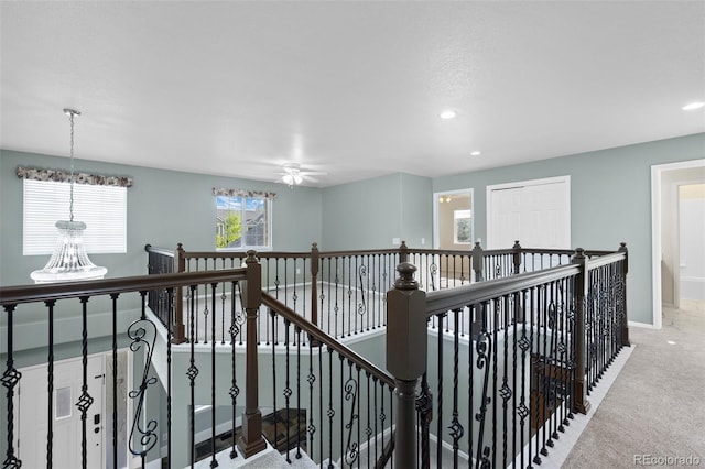 7837 Aravon Ct, Lone Tree, CO 80124 - hallway with an upstairs landing, carpet flooring, recessed lighting, and baseboards