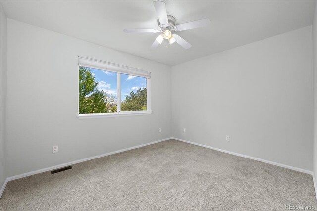 7837 Aravon Ct, Lone Tree, CO 80124 - carpeted spare room with a ceiling fan and baseboards
