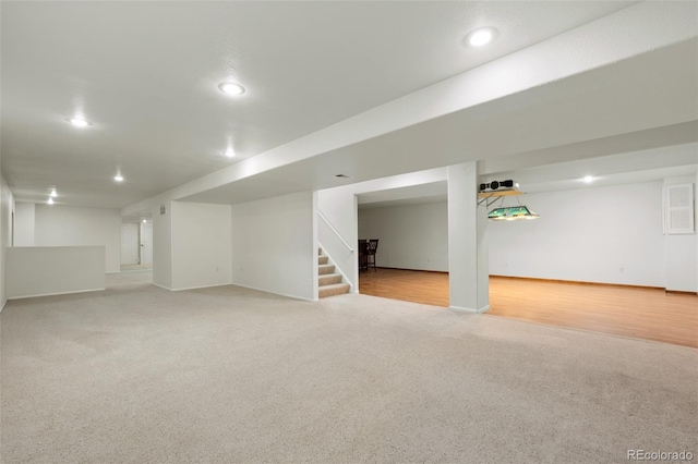 7837 Aravon Ct, Lone Tree, CO 80124 - finished basement with light carpet, stairs, recessed lighting, and baseboards
