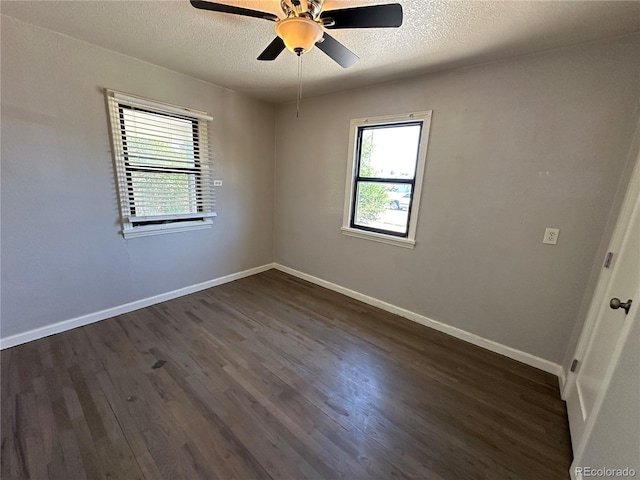 2946 W Park Pl, Denver, CO 80219 - empty room with ceiling fan, dark wood-style floors, and a textured ceiling