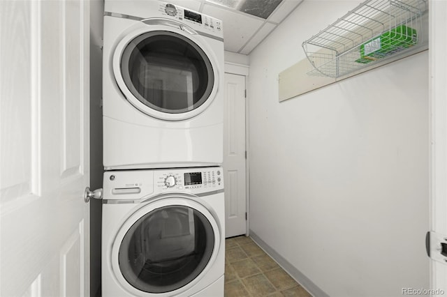 3712 Wolff St, Denver, CO 80212 - washroom with stacked washer / dryer and baseboards