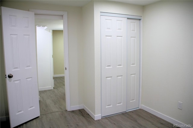 hall featuring hardwood / wood-style flooring