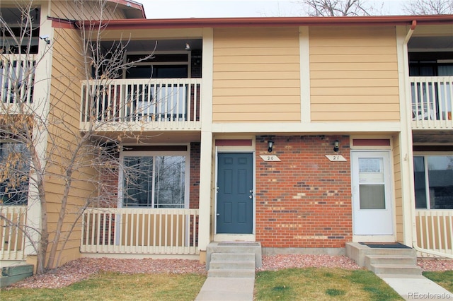 multi unit property featuring a balcony