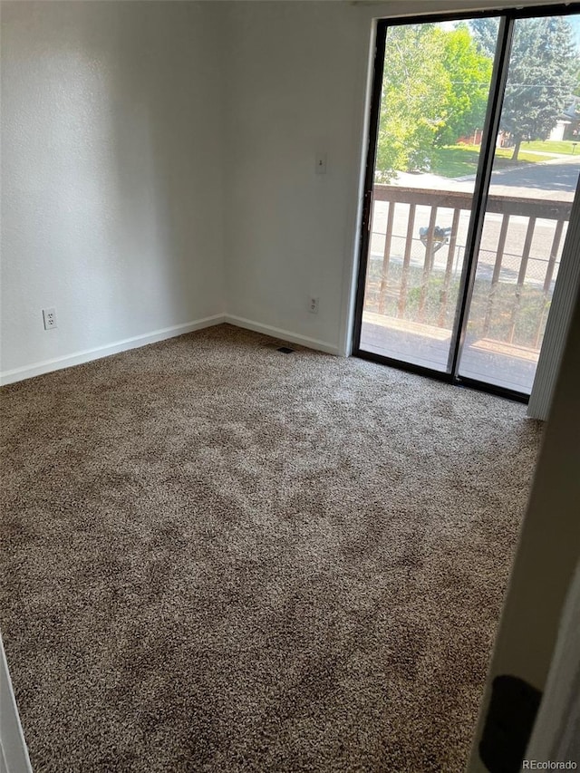 view of carpeted spare room