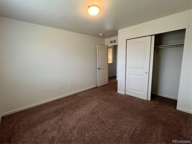 522 Foxtail Pl, Wiggins, CO 80654 - unfurnished bedroom featuring carpet, baseboards, and a closet