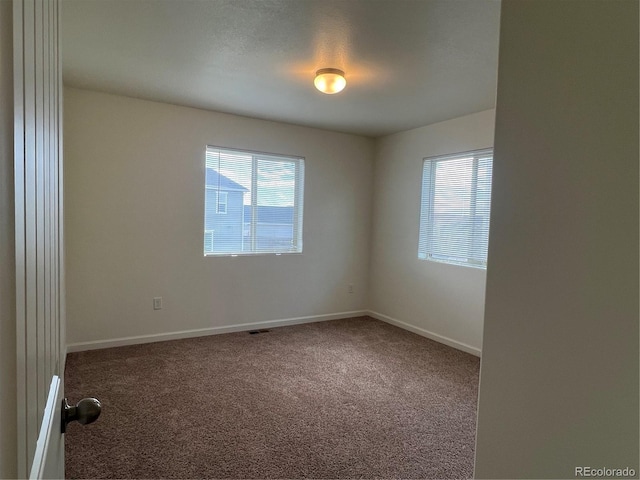 522 Foxtail Pl, Wiggins, CO 80654 - unfurnished room featuring carpet and baseboards