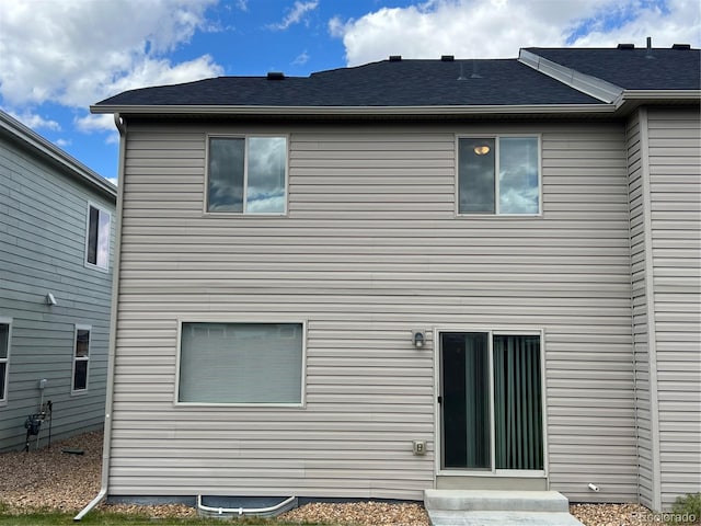 522 Foxtail Pl, Wiggins, CO 80654 - rear view of property featuring entry steps