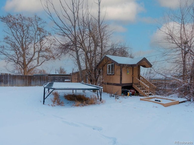 view of yard covered in snow