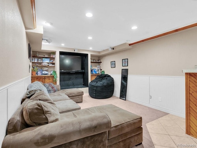 tiled living room with built in shelves