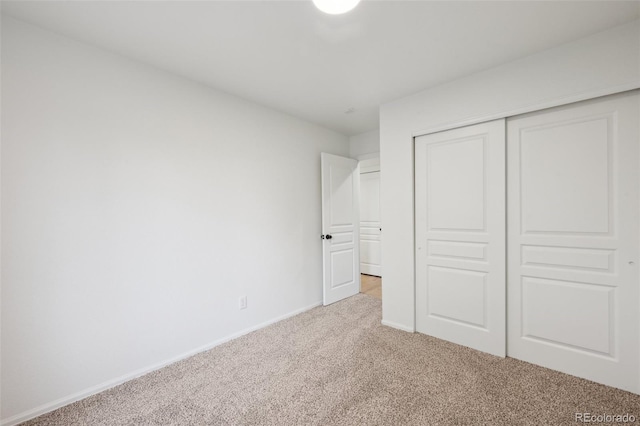 4530 Star Ridge Dr, Colorado Springs, CO 80916 - unfurnished bedroom with carpet, baseboards, and a closet