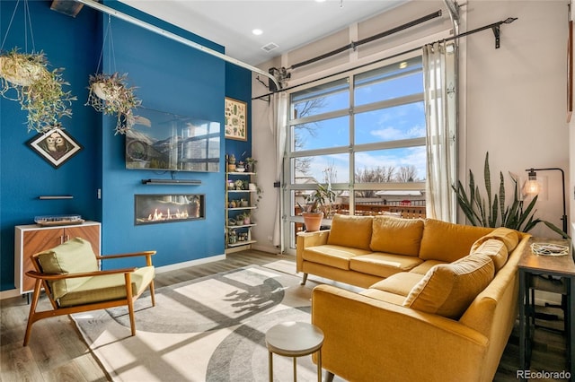 sitting room featuring hardwood / wood-style flooring