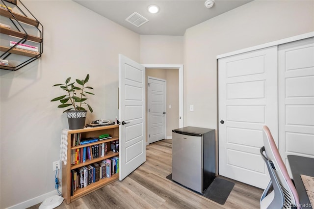 office featuring light hardwood / wood-style floors