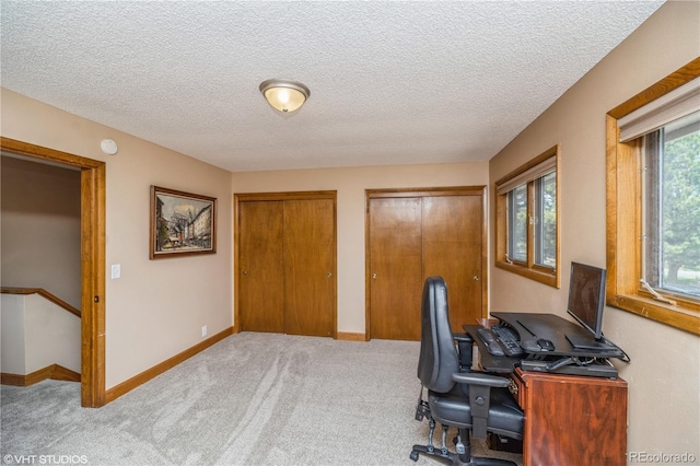 155 Xenon St Unit 33, Lakewood, CO 80228 - carpeted home office with baseboards and a textured ceiling