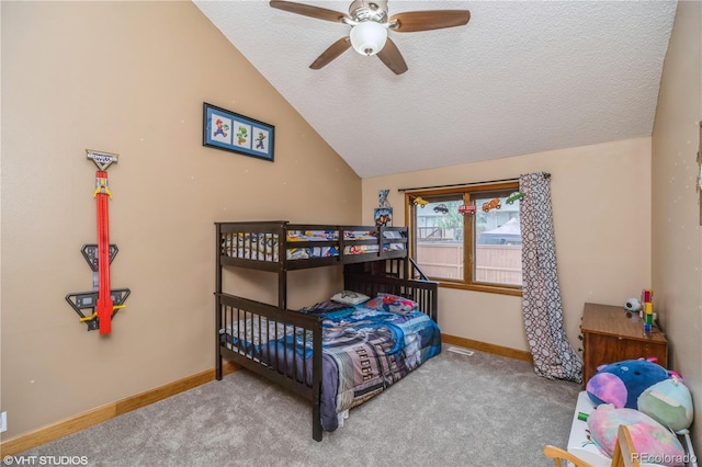 155 Xenon St Unit 33, Lakewood, CO 80228 - bedroom featuring lofted ceiling, a textured ceiling, carpet floors, baseboards, and ceiling fan