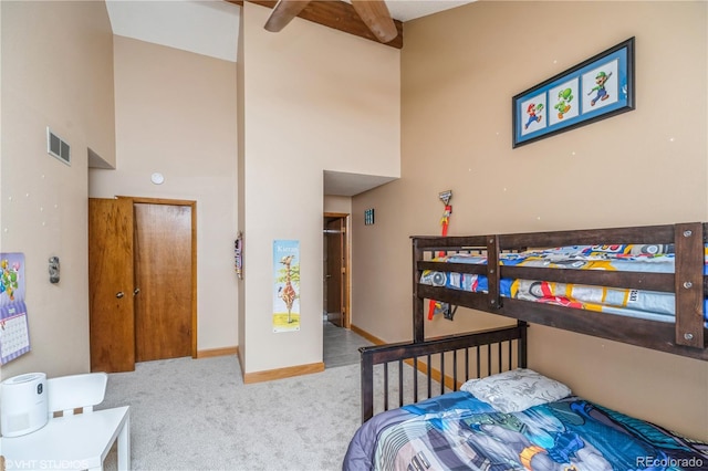 155 Xenon St Unit 33, Lakewood, CO 80228 - carpeted bedroom with a high ceiling and baseboards