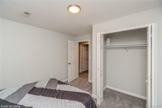 155 Xenon St Unit 33, Lakewood, CO 80228 - carpeted bedroom with a closet and baseboards