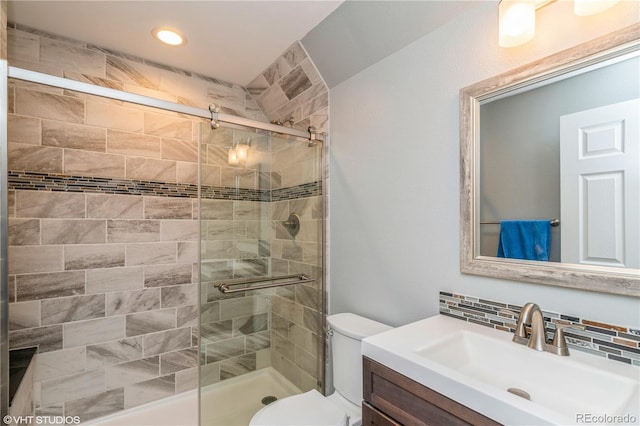 155 Xenon St Unit 33, Lakewood, CO 80228 - full bath featuring a shower stall, toilet, tasteful backsplash, vanity, and recessed lighting