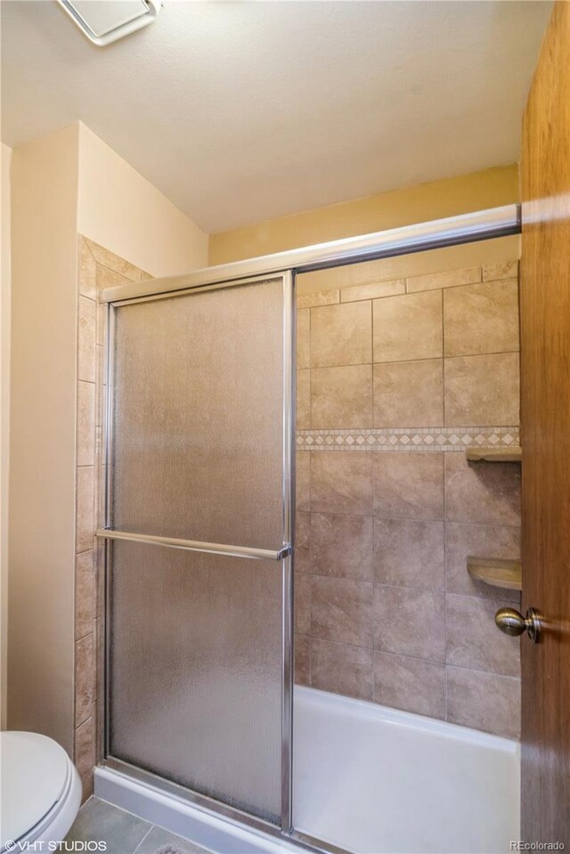 155 Xenon St Unit 33, Lakewood, CO 80228 - full bath featuring a tile shower and toilet