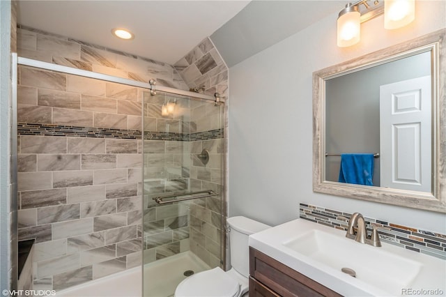 155 Xenon St Unit 33, Lakewood, CO 80228 - bathroom with a shower stall, vanity, recessed lighting, and backsplash