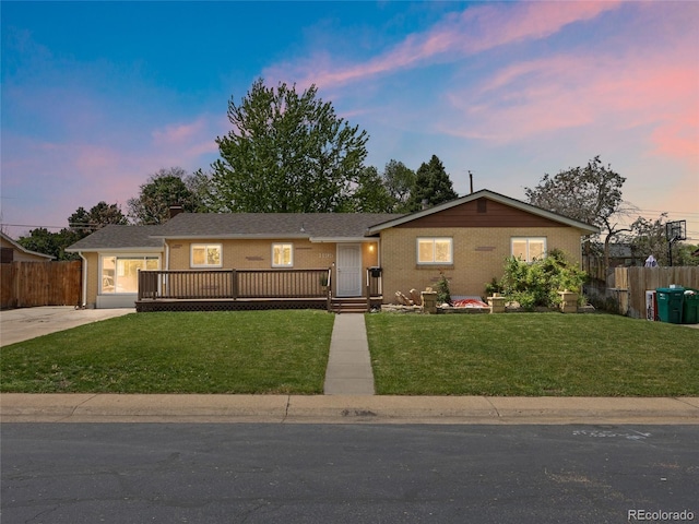 ranch-style house featuring concrete driveway and a chimney