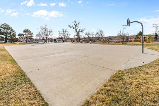 view of sport court with community basketball court and a lawn