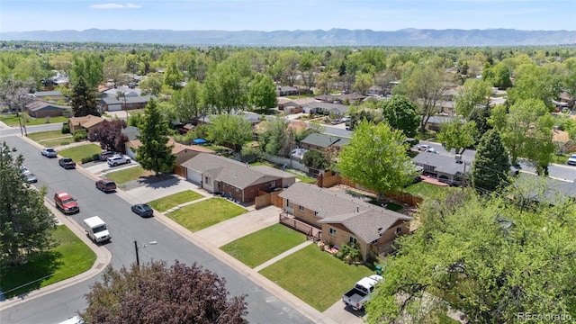 aerial perspective of suburban area featuring a mountainous background