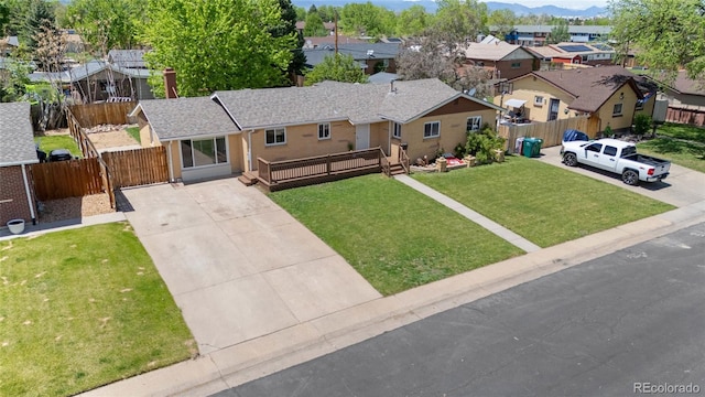 aerial perspective of suburban area with mountains