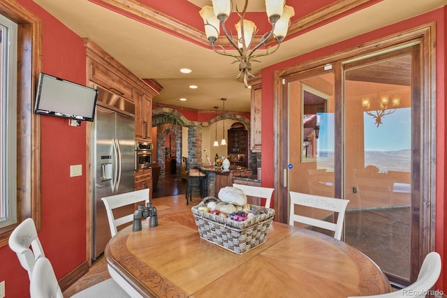 dining room with a chandelier