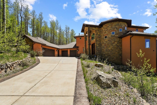 view of front of house with a garage