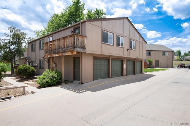 7700 W Glasgow Pl Unit 24C, Littleton, CO 80128 - multi unit property featuring an attached garage and driveway