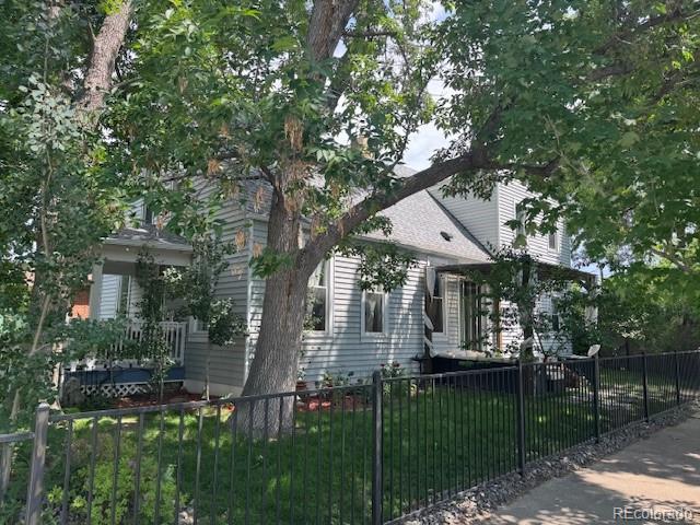 3098 W 39th Ave, Denver, CO 80211 - obstructed view of property with a fenced front yard