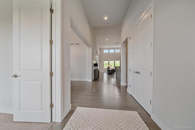 9433 Torrey Way, Arvada, CO 80007 - hallway featuring baseboards, dark wood-style flooring, and recessed lighting
