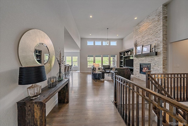 9433 Torrey Way, Arvada, CO 80007 - corridor featuring recessed lighting, wood finished floors, and baseboards