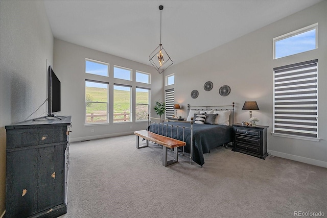 9433 Torrey Way, Arvada, CO 80007 - bedroom with baseboards, carpet flooring, and a towering ceiling