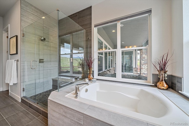 9433 Torrey Way, Arvada, CO 80007 - bathroom with a bath and a stall shower