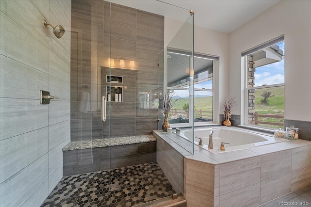 9433 Torrey Way, Arvada, CO 80007 - full bathroom with a bath and a shower stall
