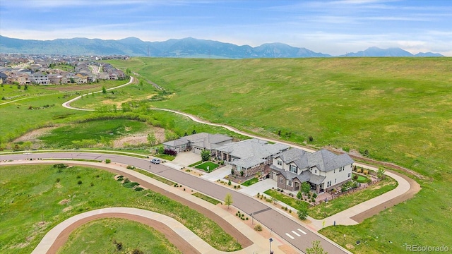 9433 Torrey Way, Arvada, CO 80007 - aerial view of residential area featuring a mountain backdrop