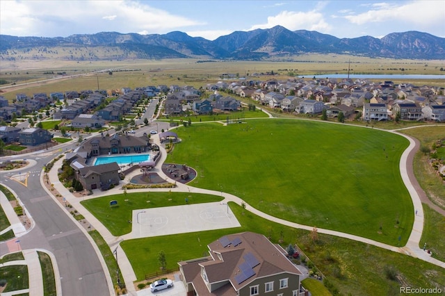 9433 Torrey Way, Arvada, CO 80007 - aerial view of residential area with mountains and a pool