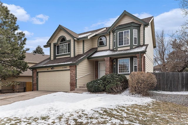 view of front of property with a garage