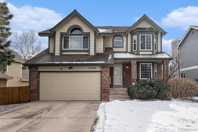 view of front of property featuring a garage